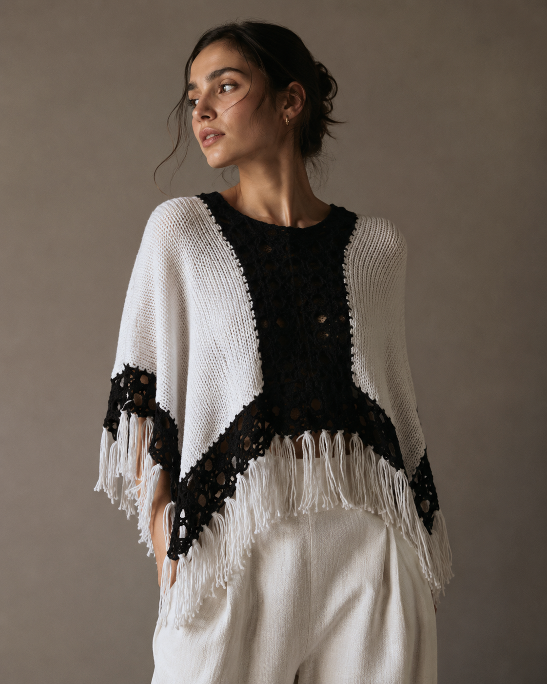 Poncho, black and white. All sizes.