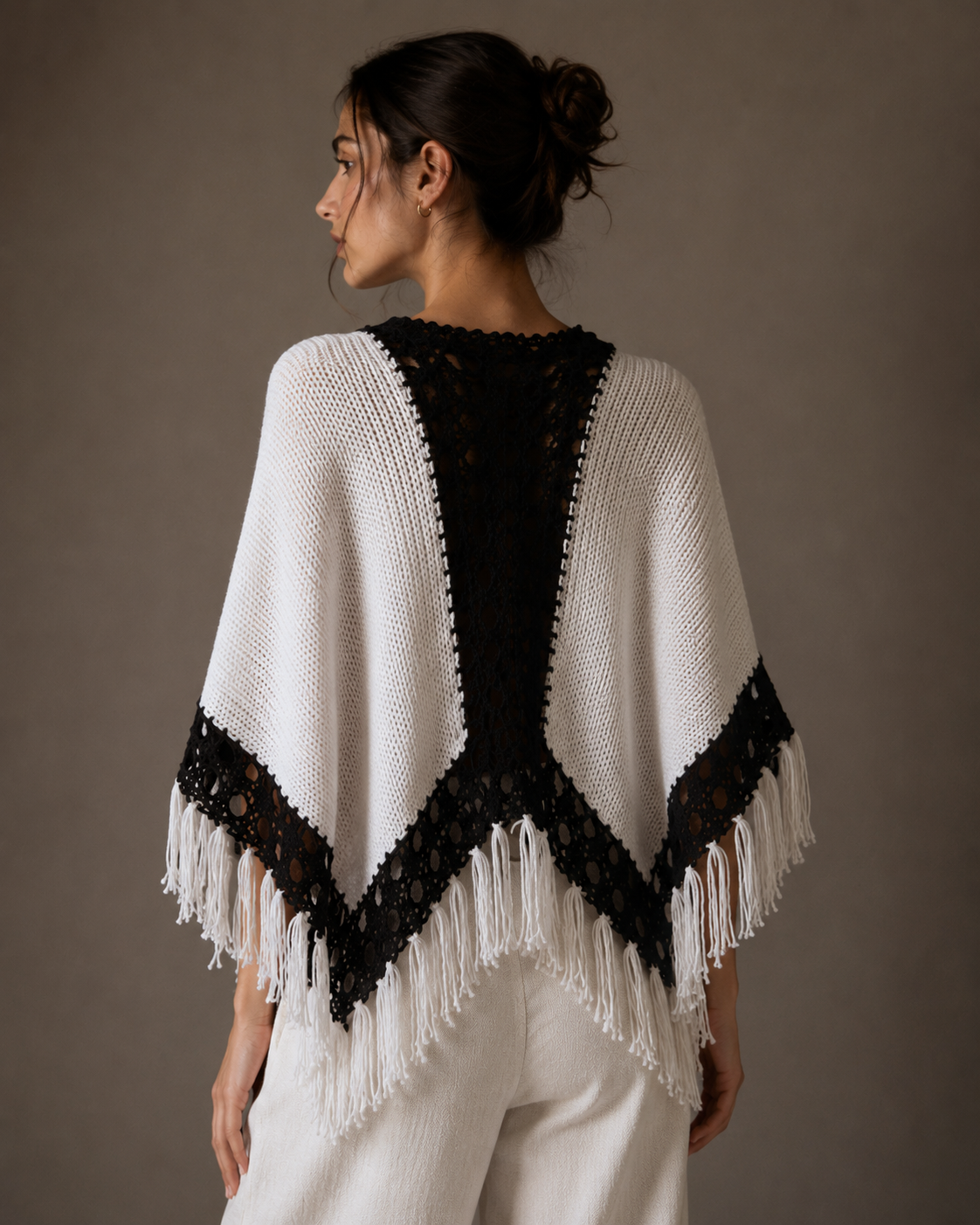 Poncho, black and white. All sizes.