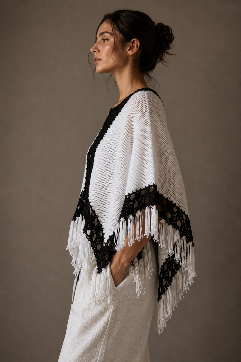 Poncho, black and white. All sizes.