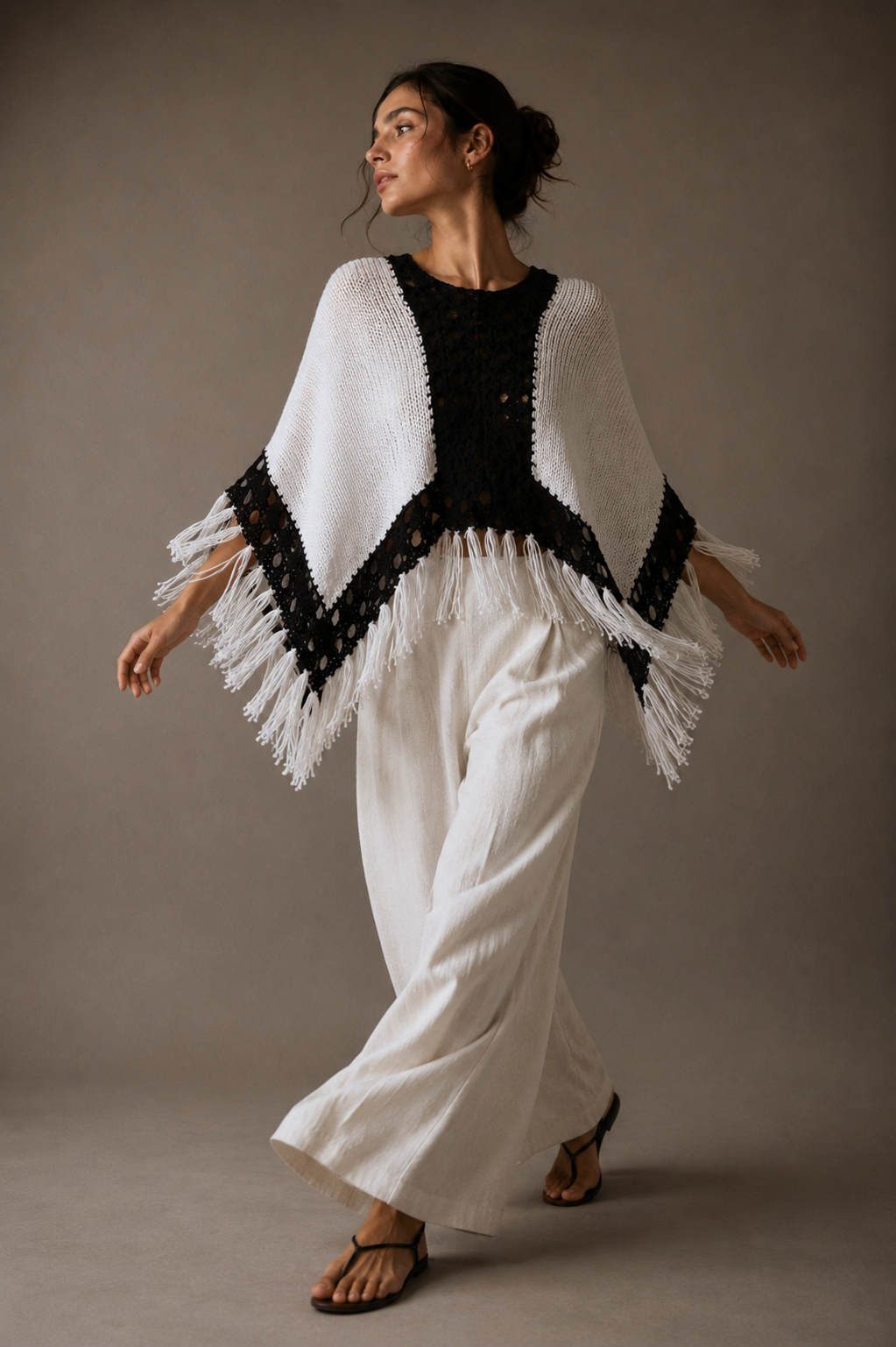 Poncho, black and white. All sizes.
