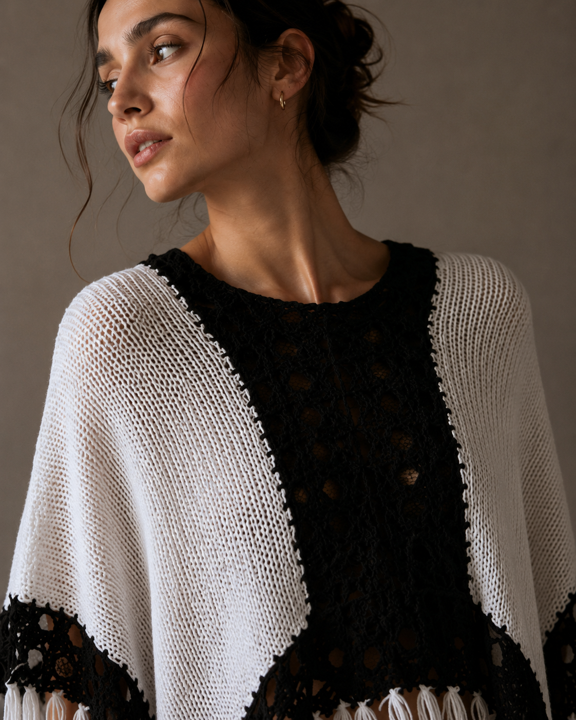 Poncho, black and white. All sizes.